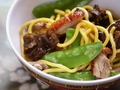 Barbecue duck stir-fry with snow peas and Hokkien noodles