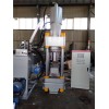 Scrap metal briquetting machine